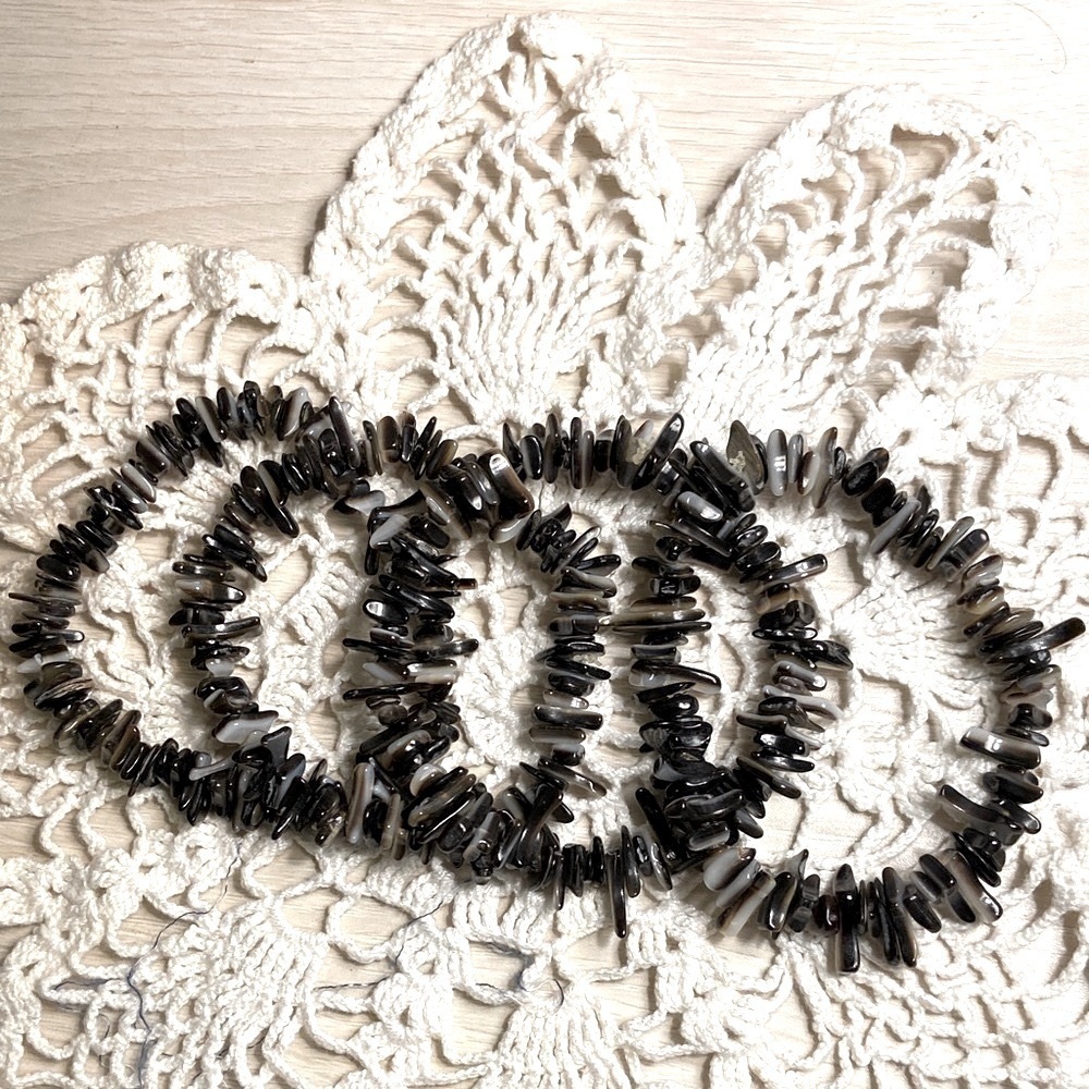 Four Black Shell Bracelet Set